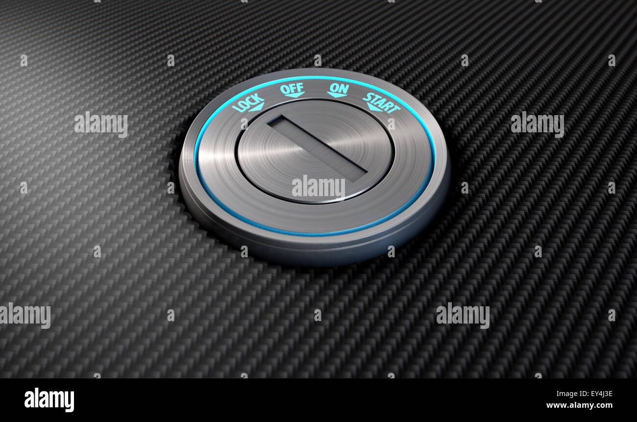 A modern chrome and blue light car ignition on a carbon fibre surface ...
