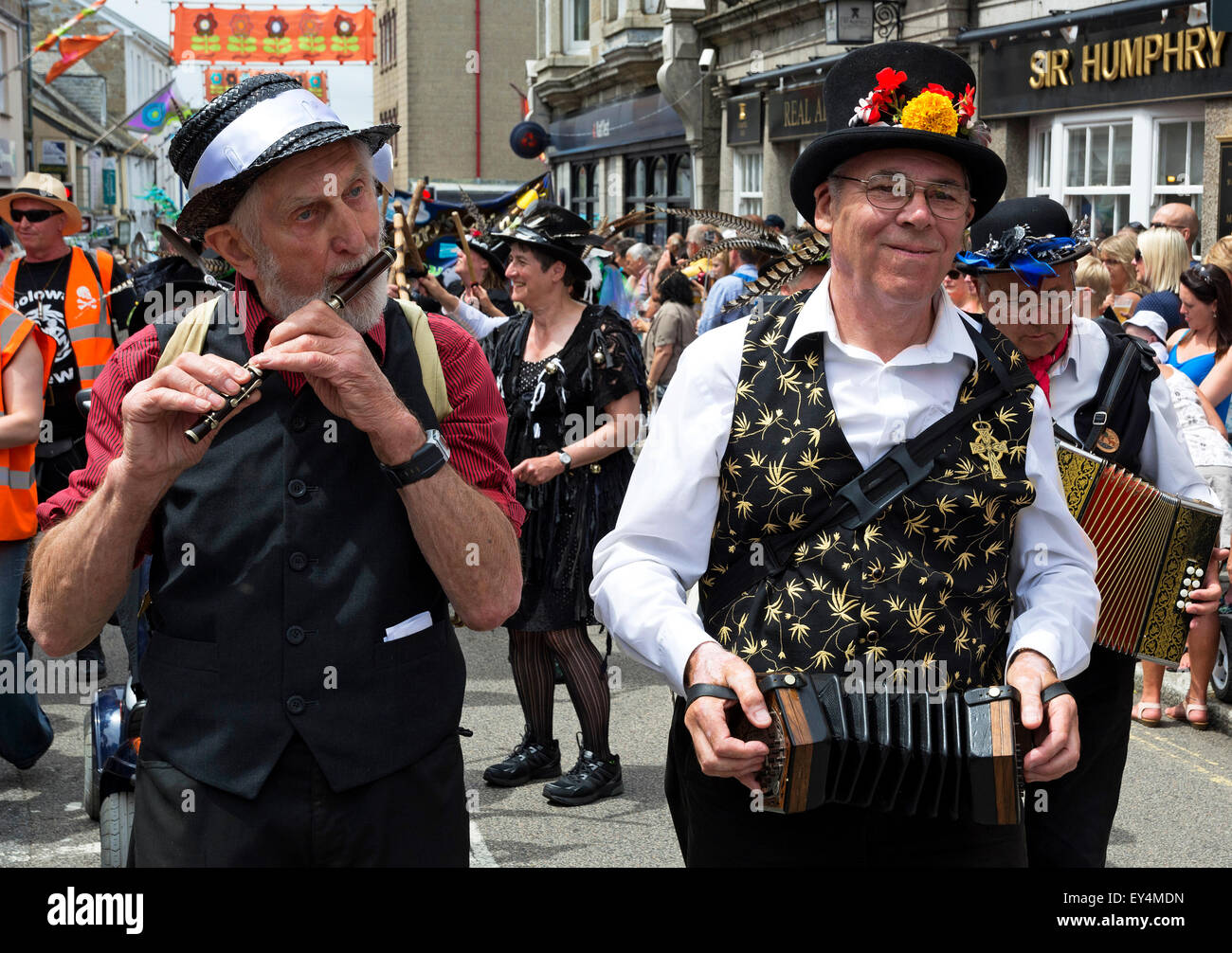 street musicians in the parade on Mazey Day, Penzance, Cornwall, UK Stock Photo