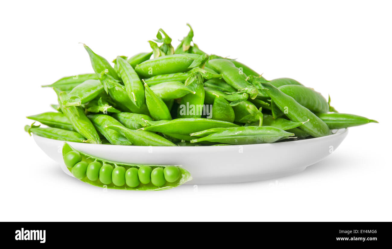 Opening and closing pea pods on white plate isolated on white background Stock Photo