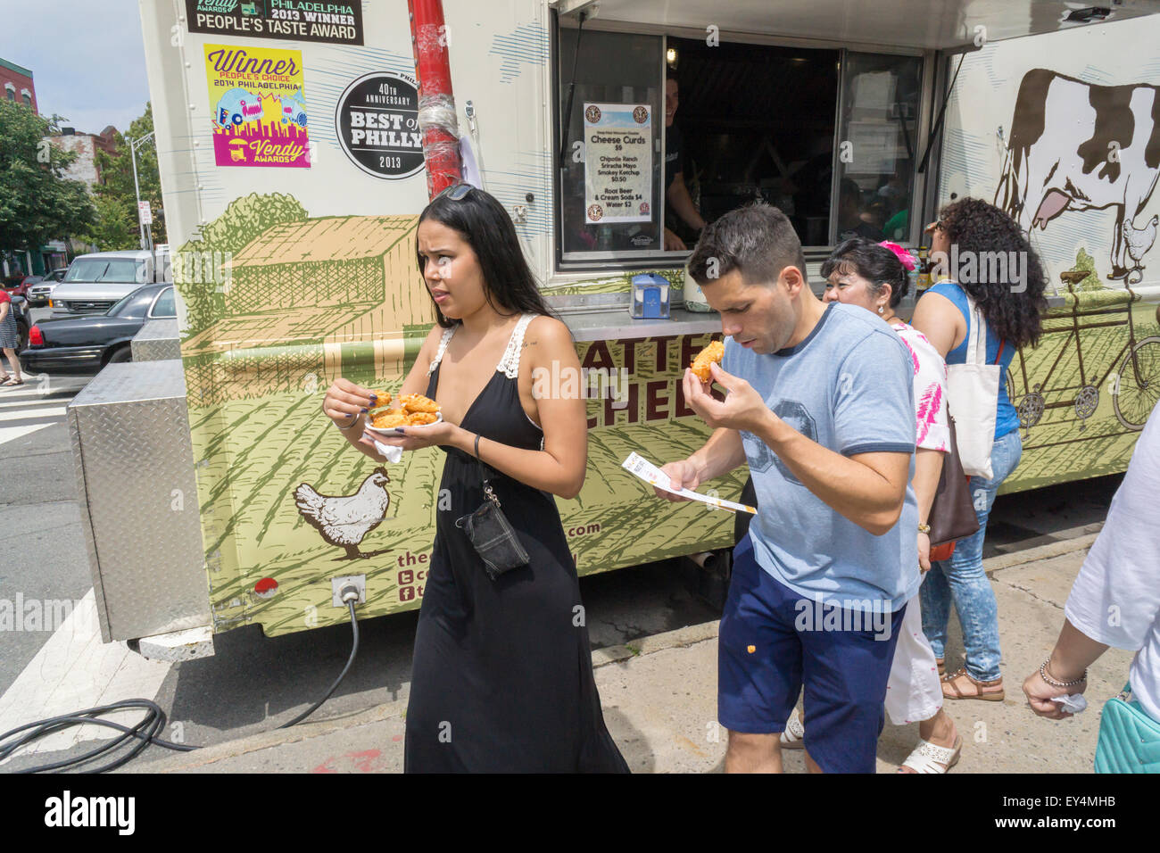 Foodies with their fried cheese curds from the Cow and the Curd food