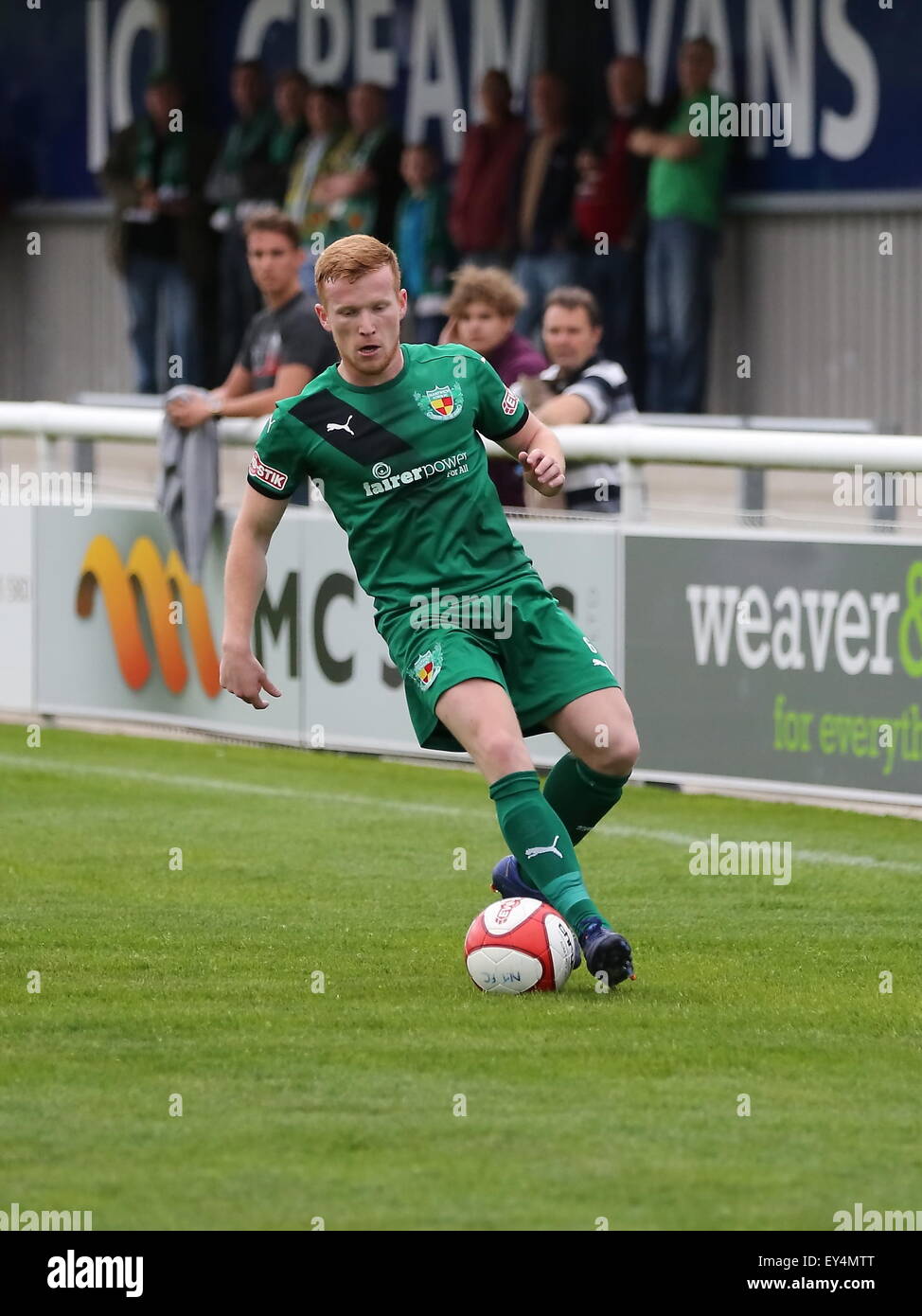 Nantwich, Cheshire, UK. 21st July, 2015. Nantwich Town entertain League Two Morecambe in a pre season friendly at The Weaver Stadium. Morecambe ran out 6-0 victors. Nantwich Town's Chris Smith on the ball. Credit:  SJN/Alamy Live News Stock Photo