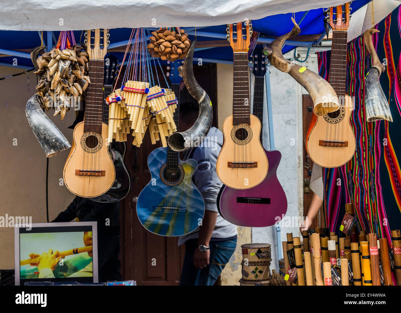 Hand-crafted traditional music instruments for sale at local market. Otavalo, Ecuador. Stock Photo