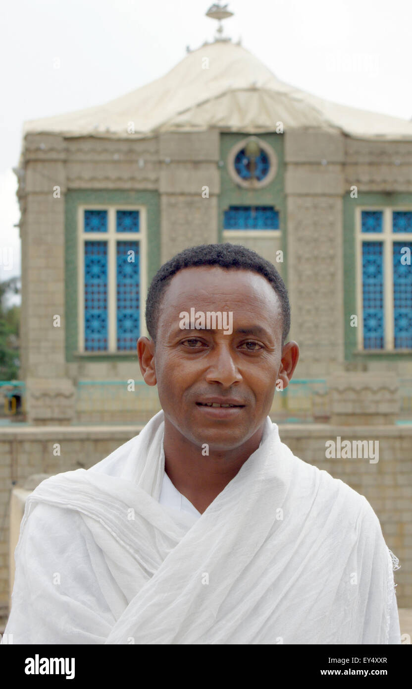 Axum, Ethiopia. 13th July, 2015. Deacon Zemikael Brhane stands in front of the new Church of Our Lady Mary of Zion in Axum, Ethiopia, 13 July 2015, which is said to contain the Tablet (or Tabot) with the Ten Commandments. Photo: Foto: Carola Frentzen/dpa/Alamy Live News Stock Photo