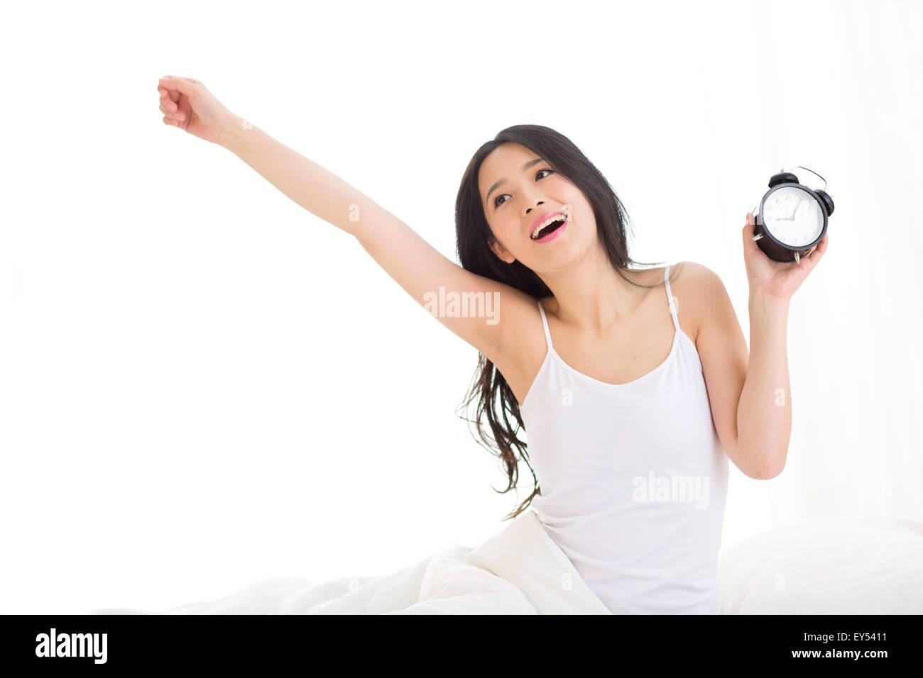Beautiful young woman wake up Stock Photo Alamy