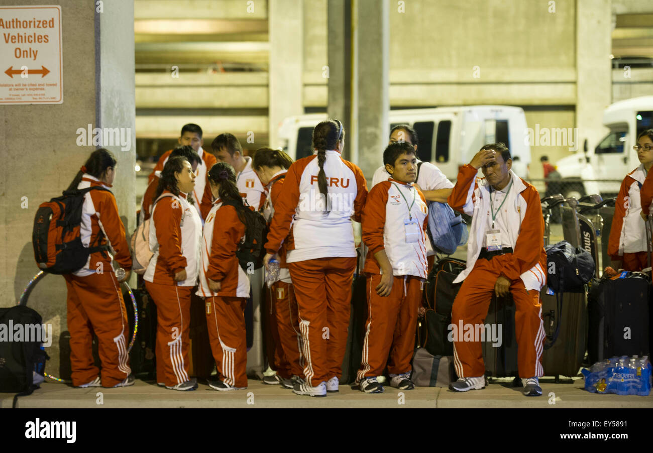 Los Angeles, USA. 21st July, 2015. Peruvian national team for 2015 Special Olympics World Summer Games wait for the shuttle bus at the Los Angeles International Airport in California, the United States, July 21, 2015. Due to the transportation failure of the Organizing Committee of 2015 Special Olympics World Summer Games, a lot of teams arriving at the airport stranded for a long time. © Yang Lei/Xinhua/Alamy Live News Stock Photo