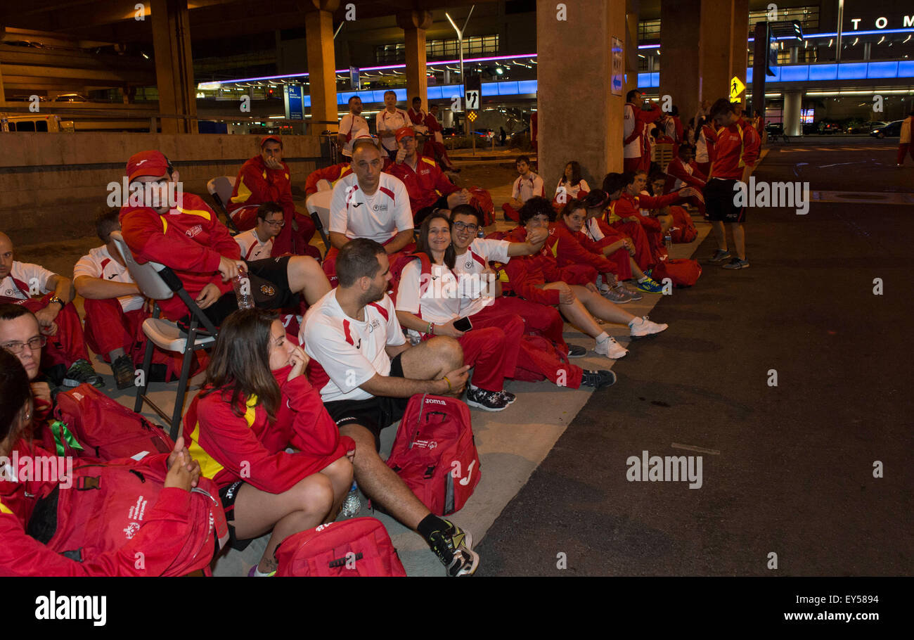 Los Angeles, USA. 21st July, 2015. Spainish national team for 2015 Special Olympics World Summer Games wait for the shuttle bus at the Los Angeles International Airport in California, the United States, July 21, 2015. Due to the transportation failure of the Organizing Committee of 2015 Special Olympics World Summer Games, a lot of teams arriving at the airport stranded for a long time. © Yang Lei/Xinhua/Alamy Live News Stock Photo