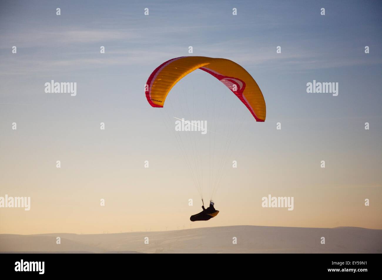 paraglider on winter day Stoodley Pike Yorkshire Stock Photo