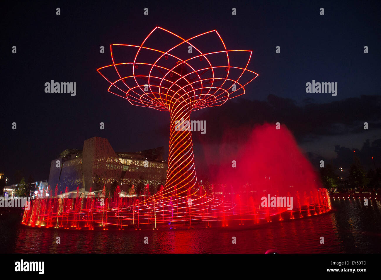 Italy Milan Expo Tree of Life on the lake outside and Arena at night 2015, architecture, building, city, colorful, construction, Stock Photo
