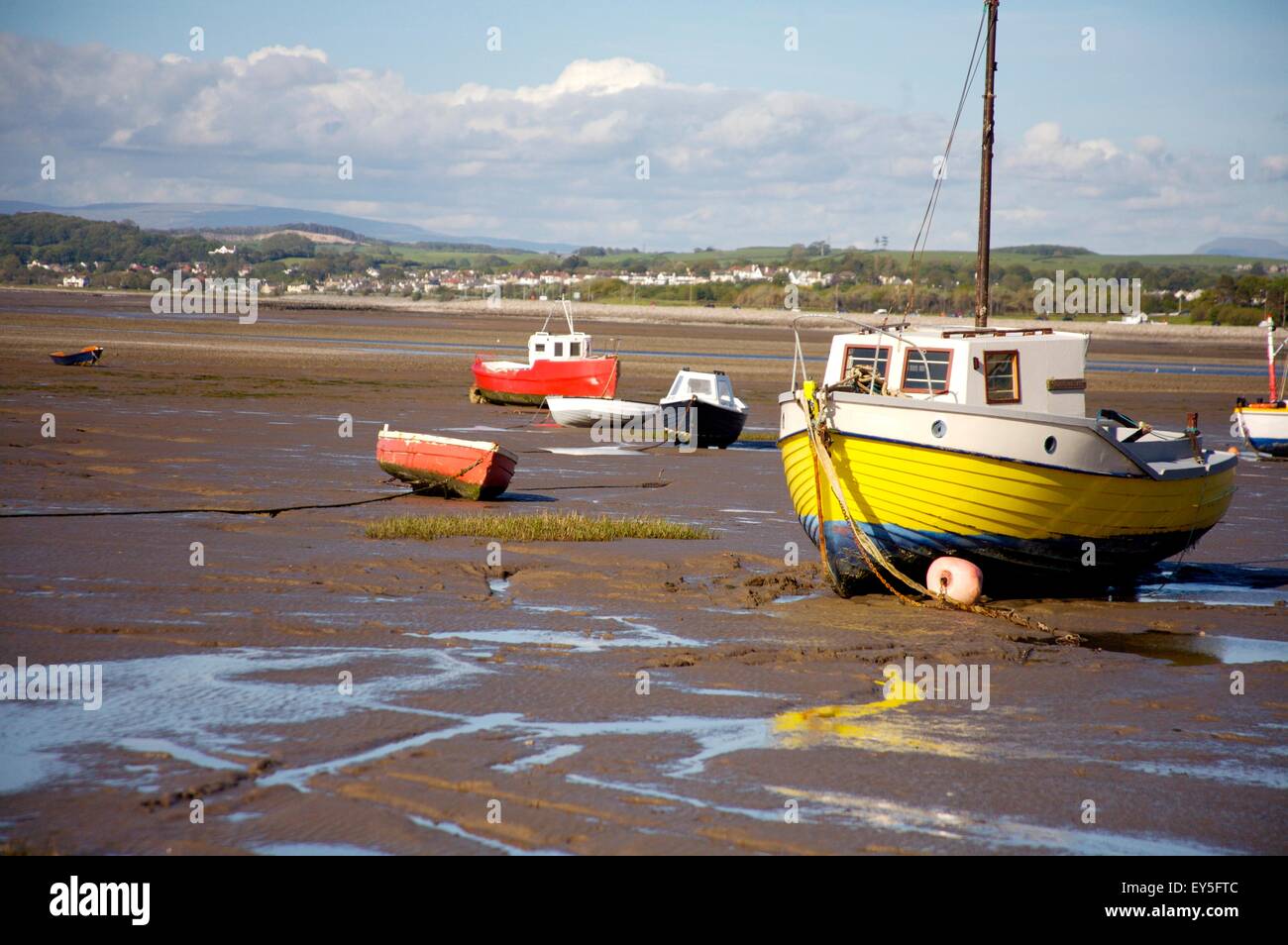 Boats on tidal flats at Morecambe Bay, Lancashire, England Stock Photo