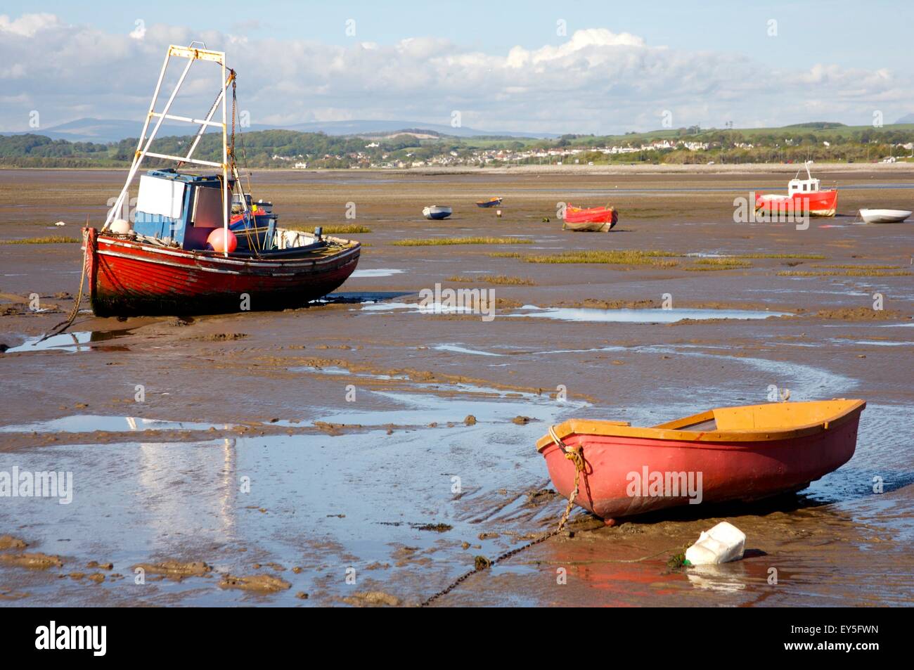 boats at low tide on Morecambe Bay, Morecambe, Lancashire, England with Lake District hills in background Stock Photo