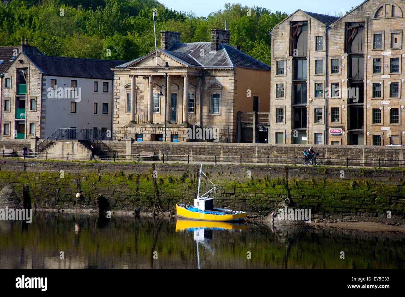 little fishing boat moored in front of Maritime Museum on River Lune in Lancaster Stock Photo