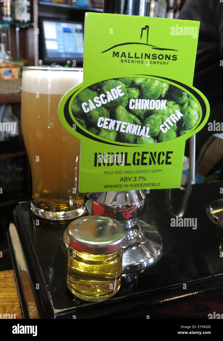 Mallinsons Indulgence, Real Ale on handpump, with taster bottle to show colour Stock Photo
