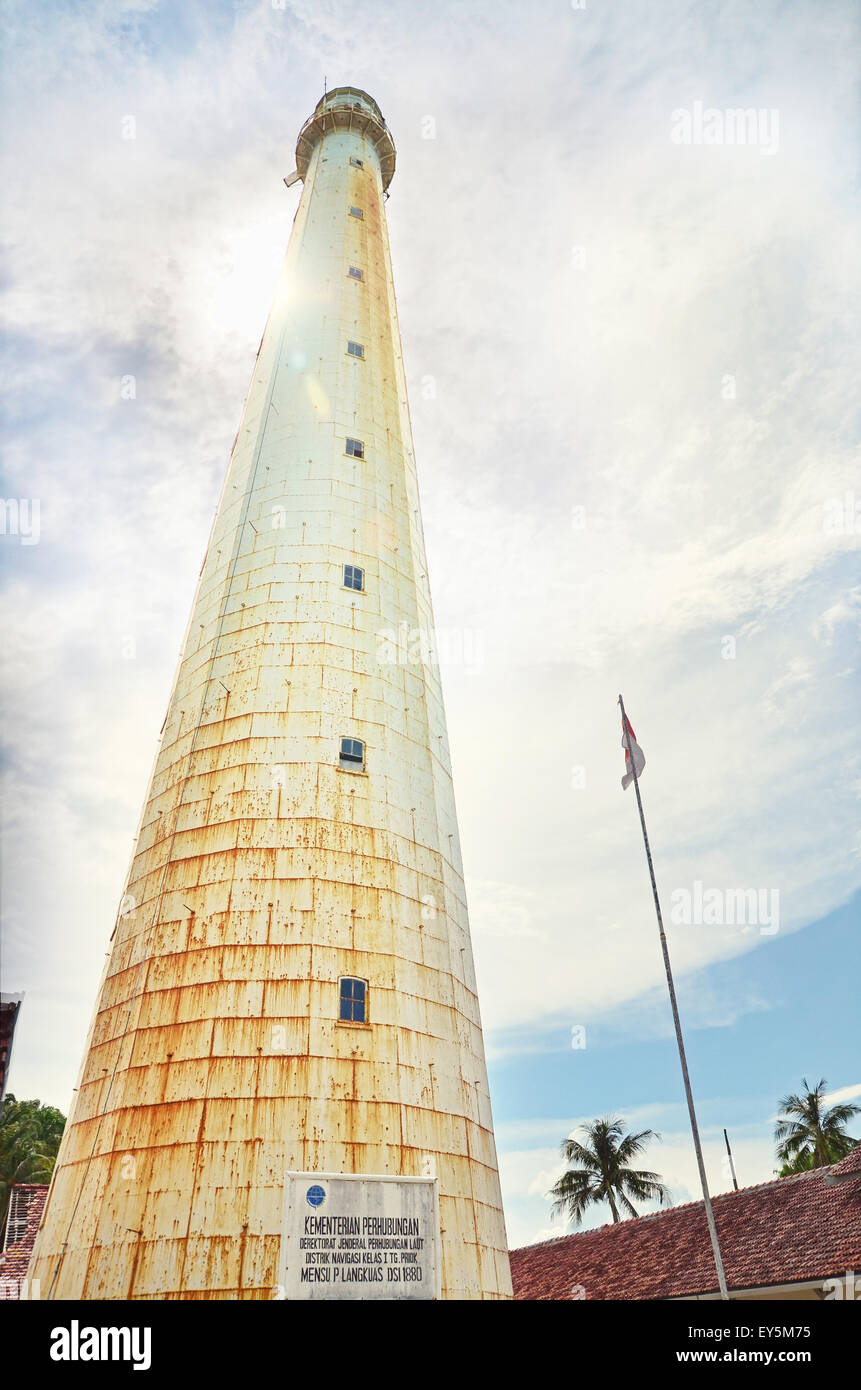 High lighthouse tower in Lengkuas Island Stock Photo