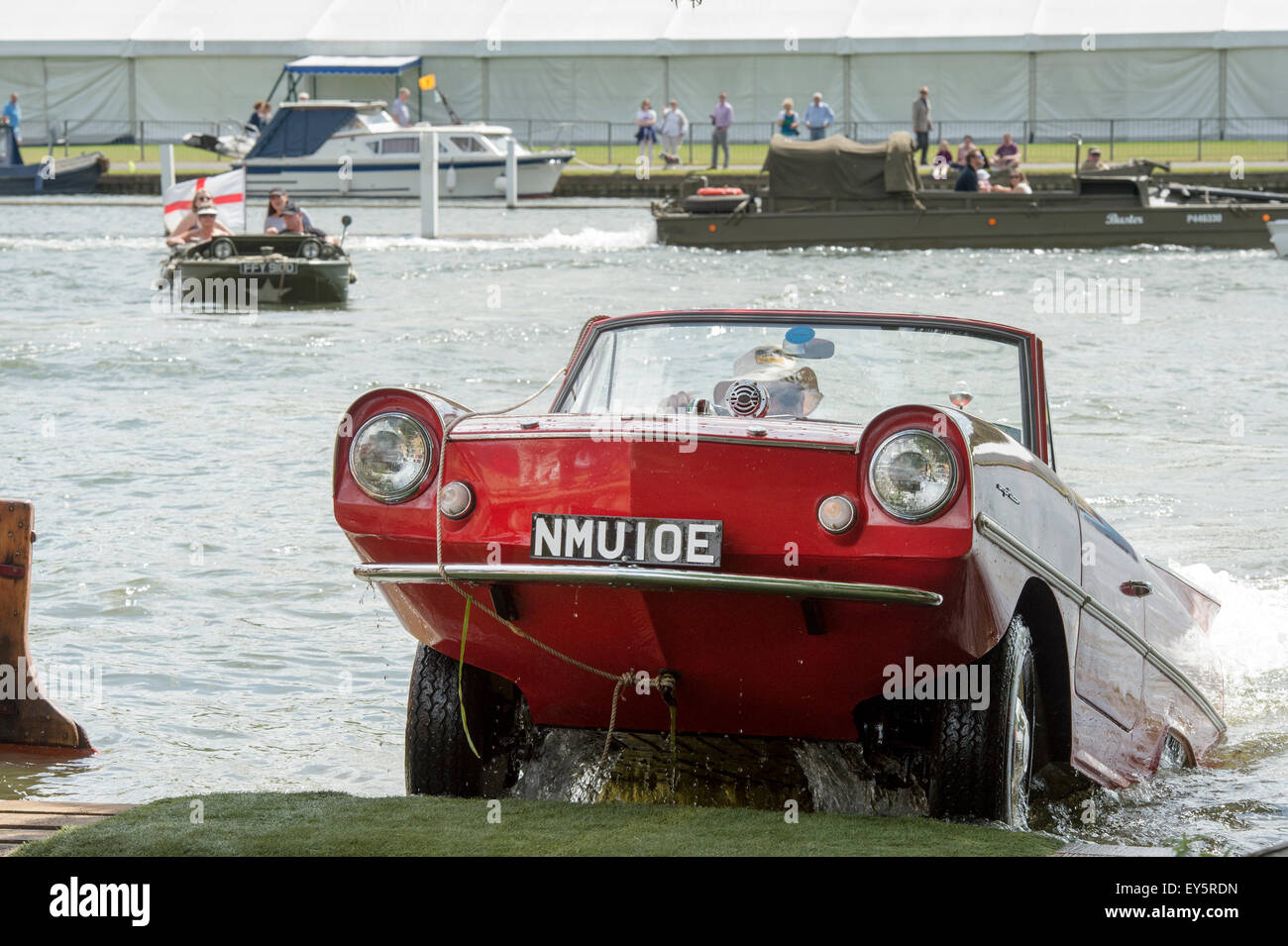 Amphicar driving out of the river at the Thames Traditional Boat Festival, Fawley Meadows, Henley On Thames, Oxfordshire, England Stock Photo