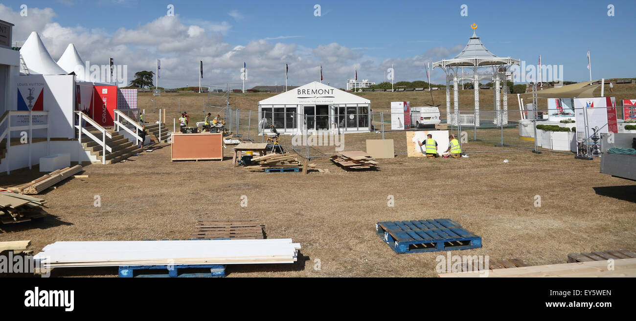 Southsea, Hampshire Wednesday 22 July 2015. GV showing the World Series Village being built. A 48 meter ferris wheel has been buiIt on the seafront.  The site will be the heart of all the action and is just days away from taking shape. The World Series race village on Southsea Common will accommodate families and hardcore sailing fans alike.The best views of the action will be seen here.  Visitors will have a close-up view of the racing as well as the benefit of large screens, live coverage and commentary. Tickets to the VIP area have sold for up to 6,000  Credit:  uknip/ Alamy Live News Stock Photo