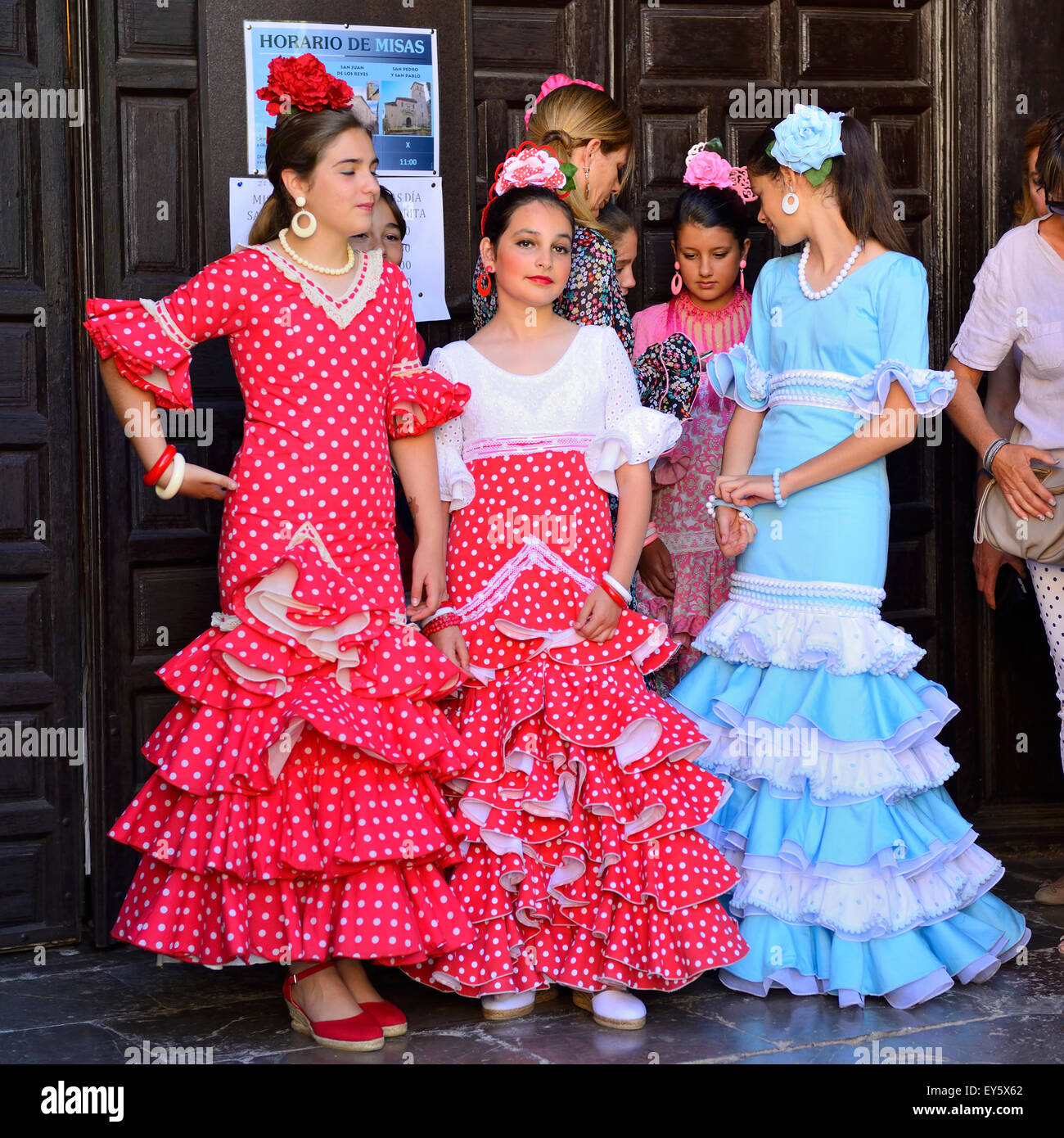 Spanish women in traditional Spanish feria dress prior to festival ...