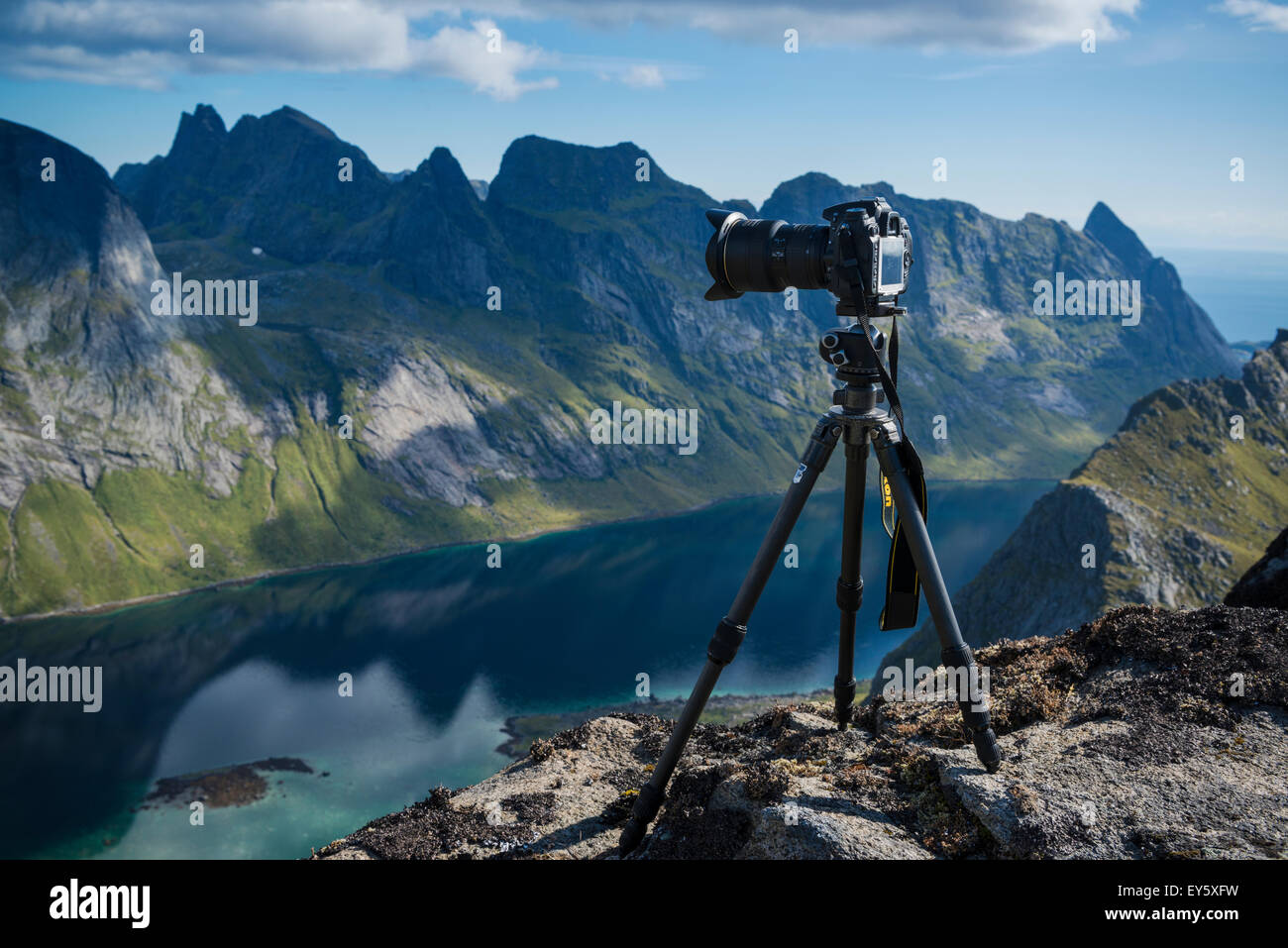 Camera and tripod in mountain landscape, Moskenesøy, Lofoten Islands, Norway Stock Photo