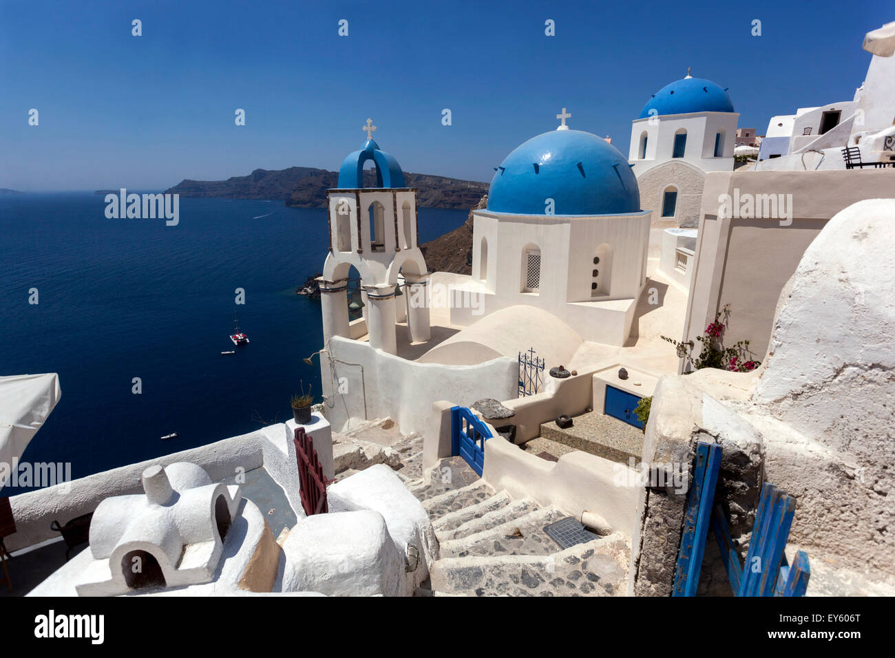 View to the blue domed churches in the Oia village by the cliff, Santorini, Cyclades Islands, Greek Islands, Greece, Europe Stock Photo