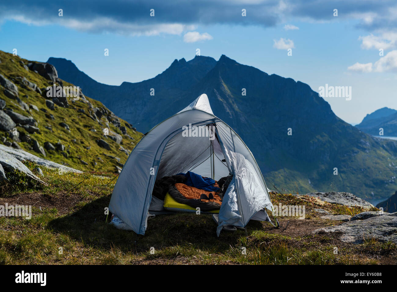 Tent camping in mountain landscape, Moskenesøy, Lofoten Islands, Norway Stock Photo