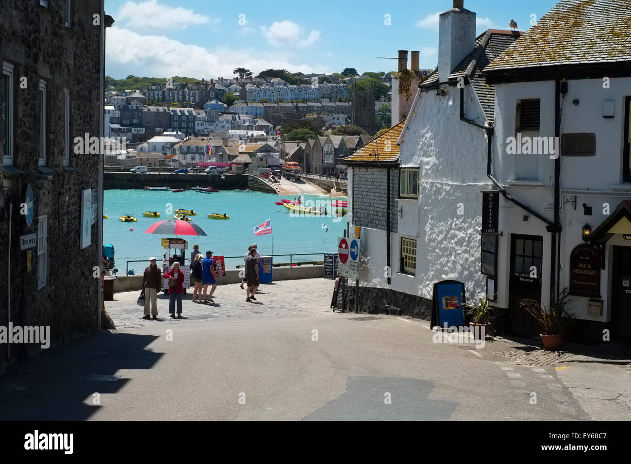 A street leading down to the harbour in St. Ives, Cornwall, England, UK Stock Photo