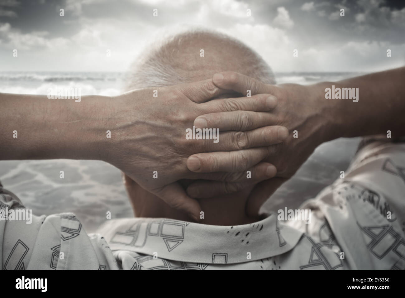 Old man hands behind back hi-res stock photography and images - Alamy