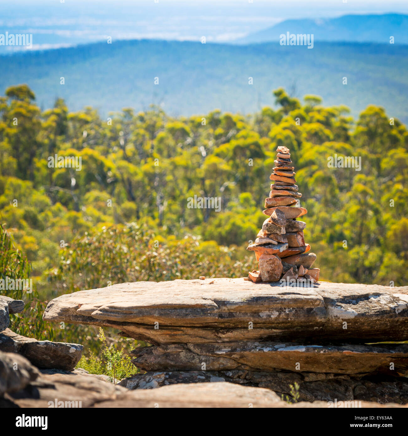 Pile of stones in perfect balance in shallow focus with natural background Stock Photo