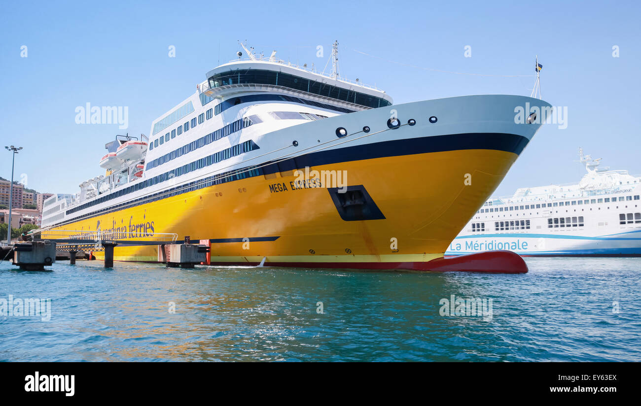 Ajaccio, France - June 30, 2015: The Mega Express ferry, big yellow passenger ship operated by Corsica Ferries Sardinia Ferries Stock Photo