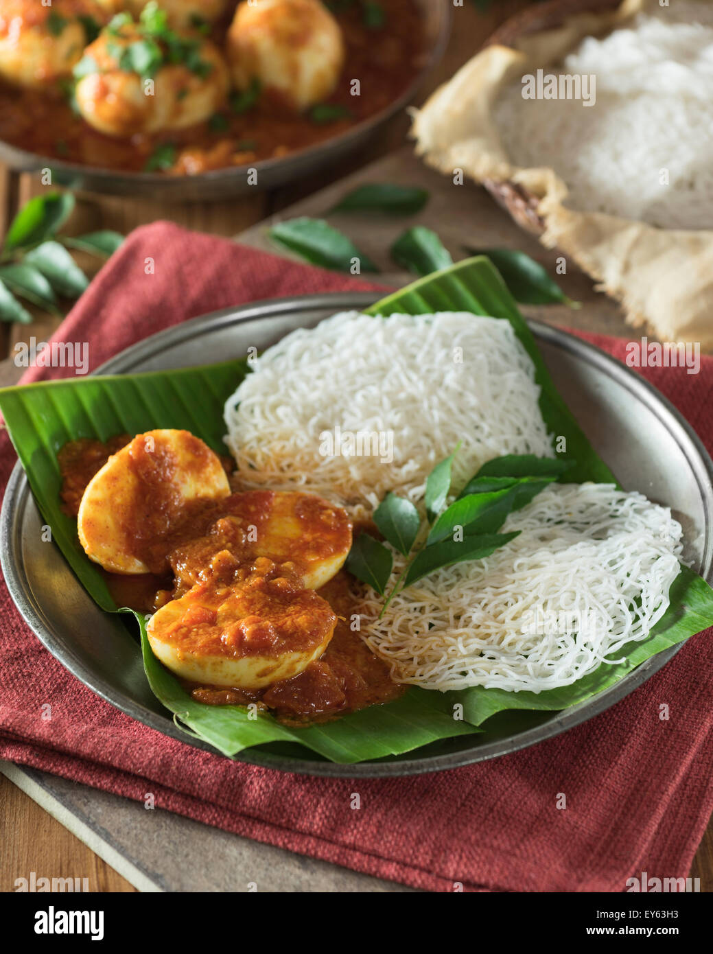 Egg curry and string hoppers. Sri Lanka and South India Food Stock