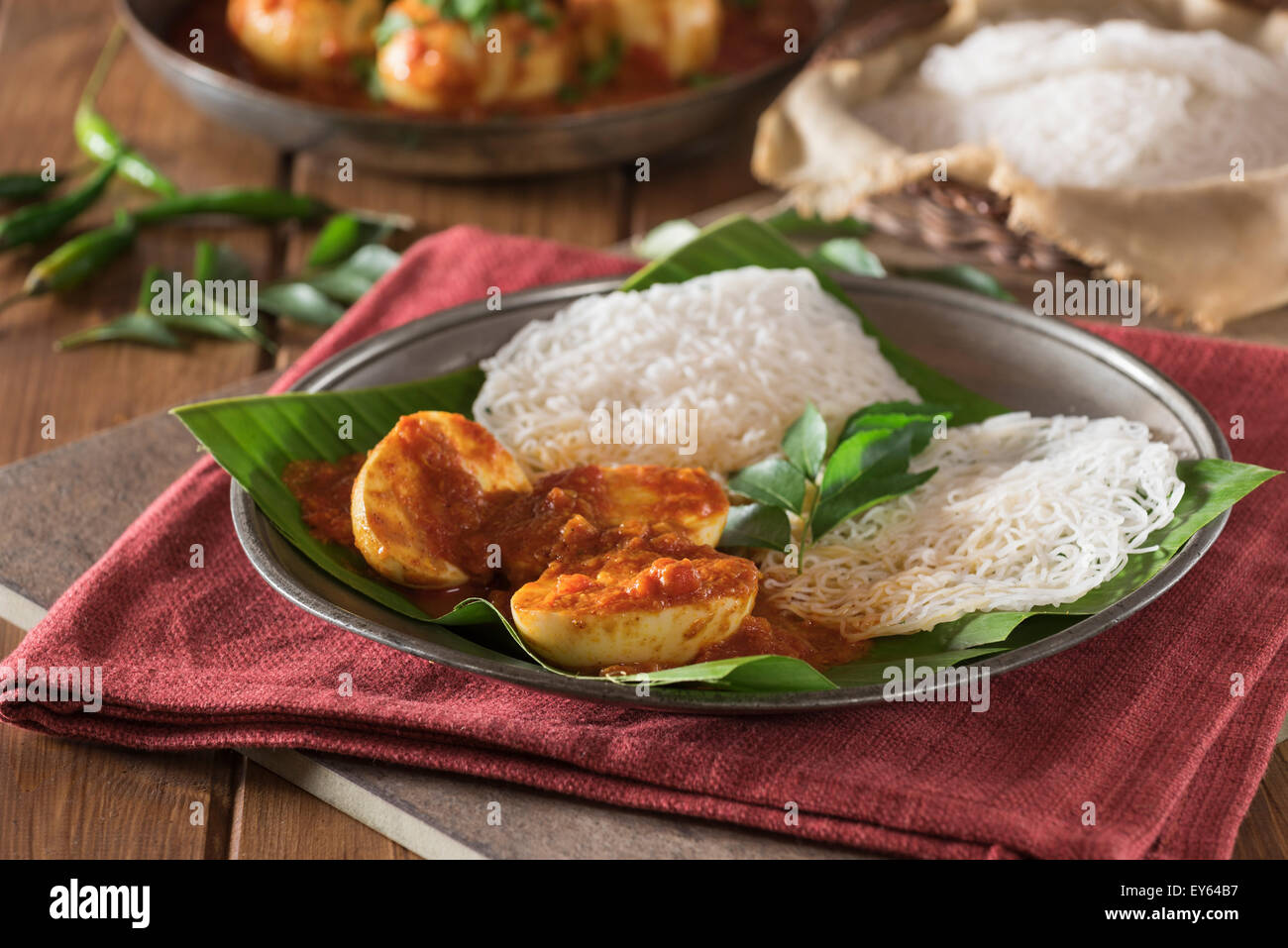 Egg curry and string hoppers. Sri Lanka and South India Food Stock Photo