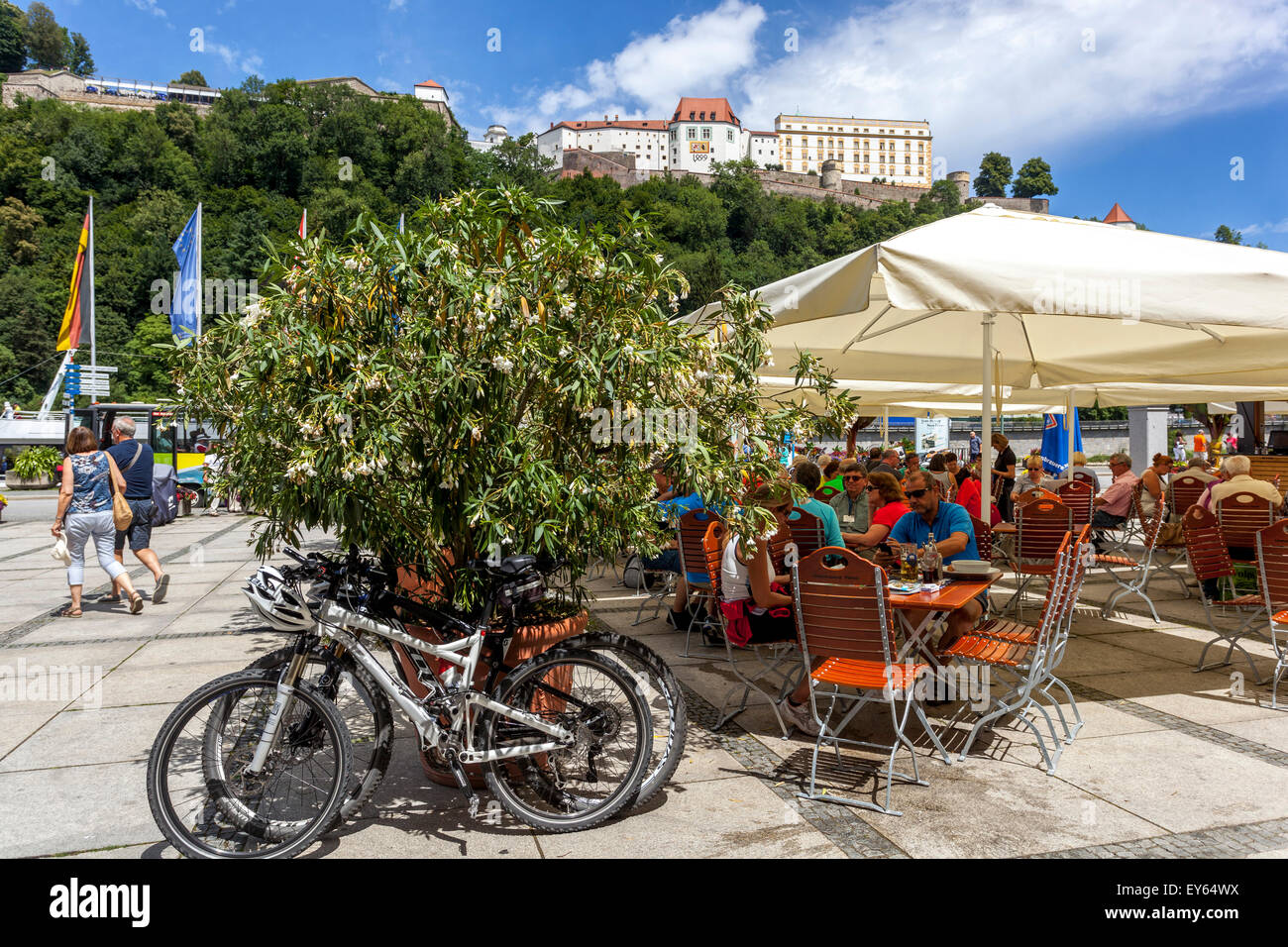 Passau Germany Altstadt People bicycle at Rathausplatz restaurant bar