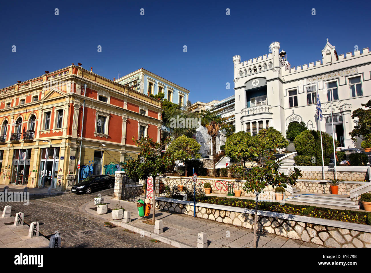 A 'complex' of beautiful, colorful neoclassical buildings in Kavala town, Macedonia, Greece. To the right, the Town Hall. Stock Photo