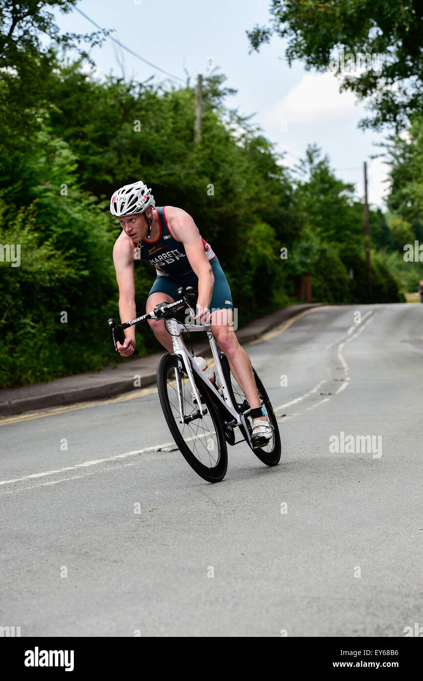 Triathlete Lestyn Harrett on the bike split during the 2015 Jenson Button Trust Triathlon in aid of Cancer Research Stock Photo