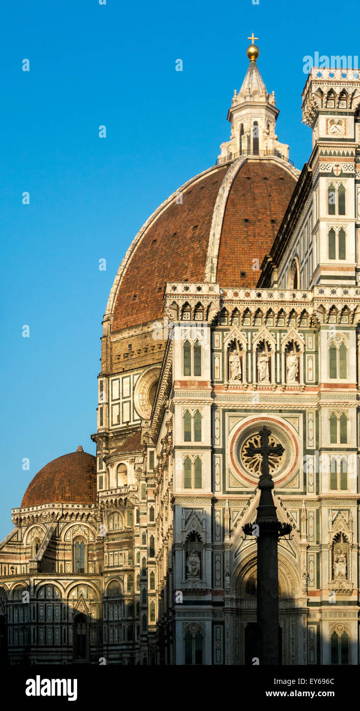 Florence Cathedral west façade with its dome in the background and the Column of Saint Zanobi in the foreground. Florence, Italy. Stock Photo