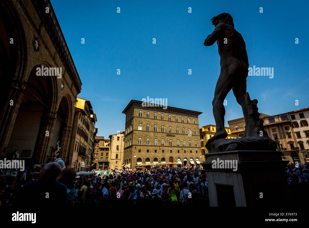 Rear view of Michelangelo's statue of David and sculptures at Loggia Della Signoria. Florence, Italy. Stock Photo