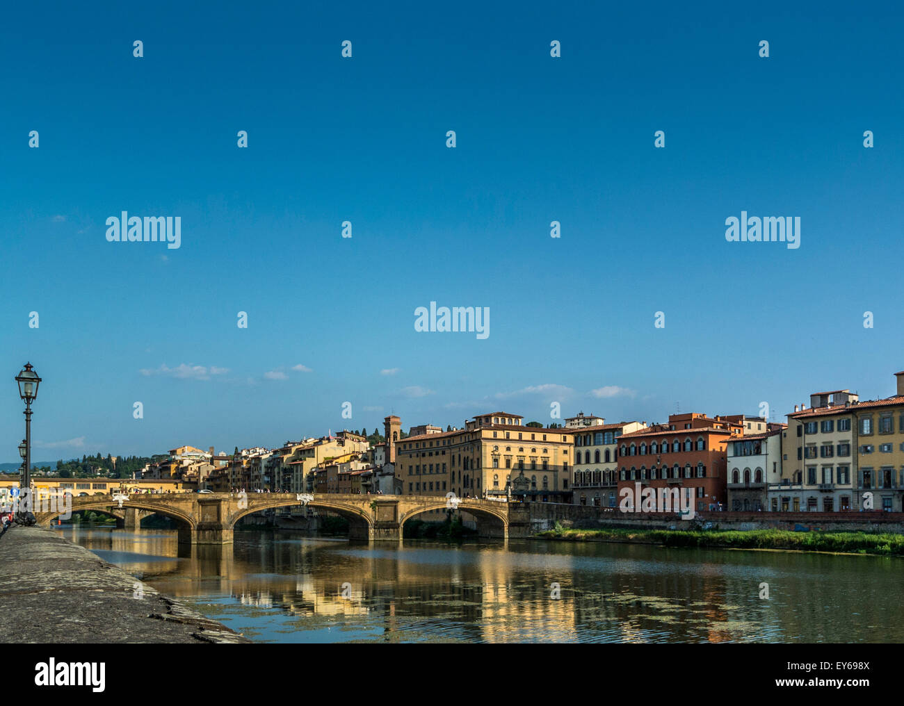 Ponte Santa Trinita and river Arno. Florence, Italy. The Ponte Santa Trìnita is the oldest elliptic arch bridge in the world. Stock Photo