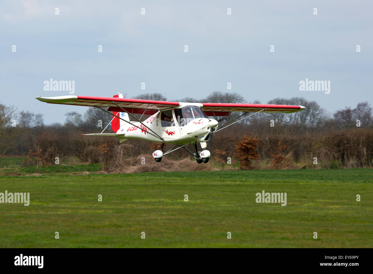 Ikarus C42 FB UK G-CBGP landing at Breighton Airfield Stock Photo