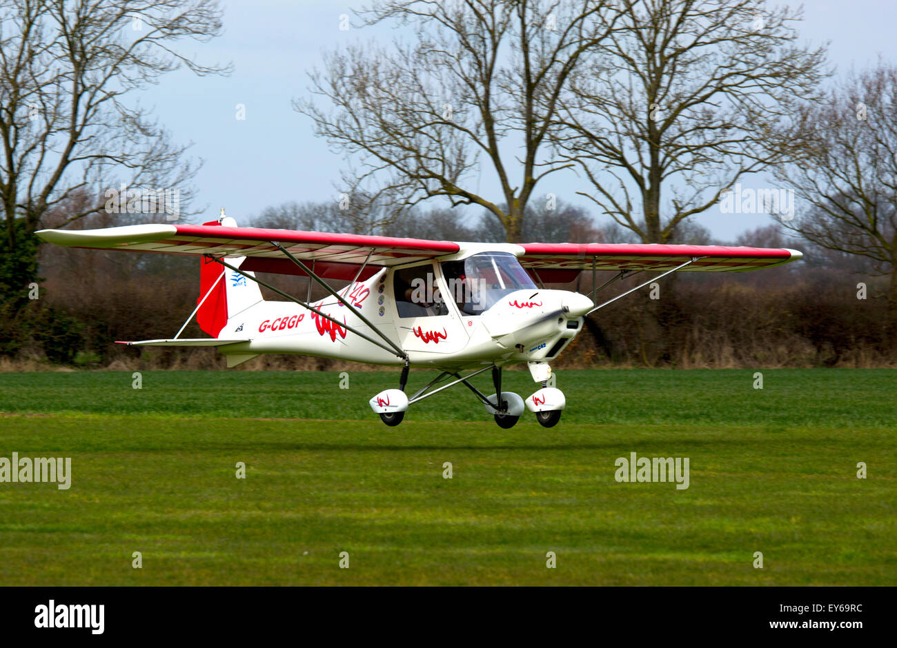 Ikarus C42 FB UK G-CBGP landing at Breighton Airfield Stock Photo