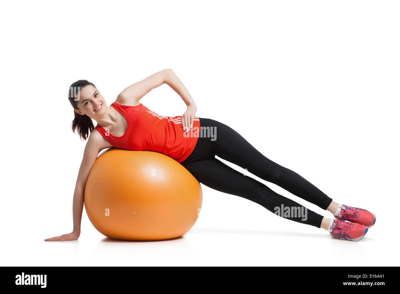 Beautiful sport woman doing  fitness exercise on ball Stock Photo