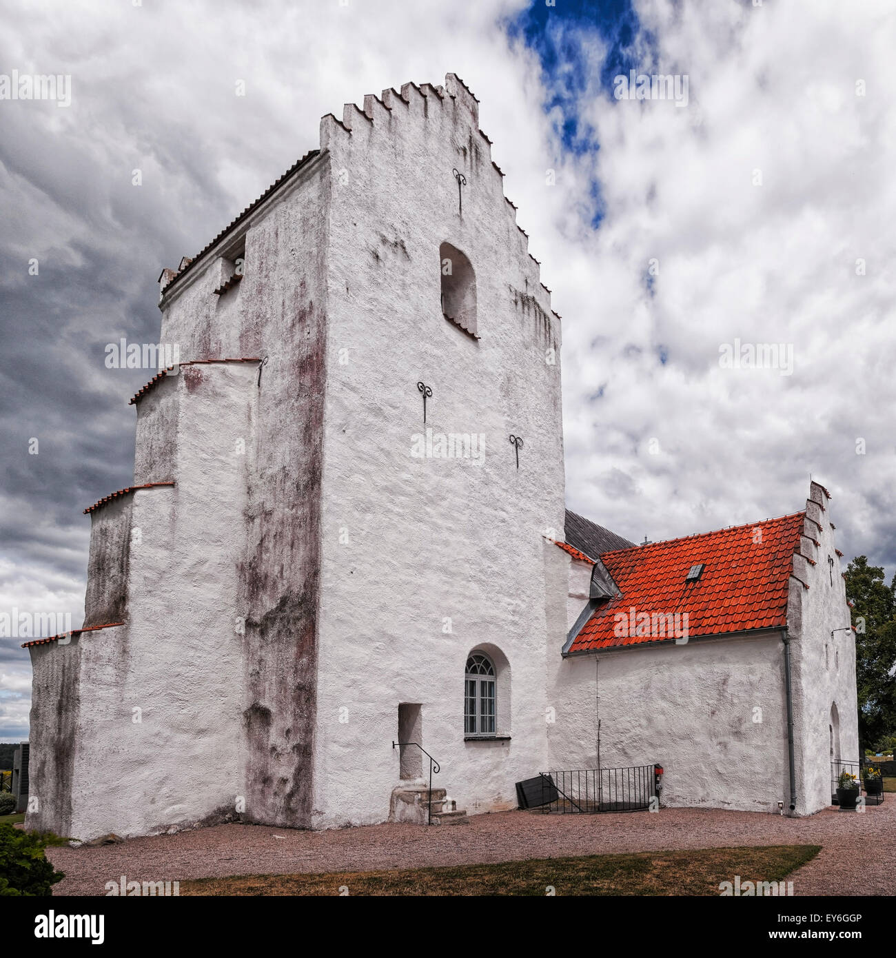 An image of the old white Ravlunda church in the swedish region of Skane. Stock Photo