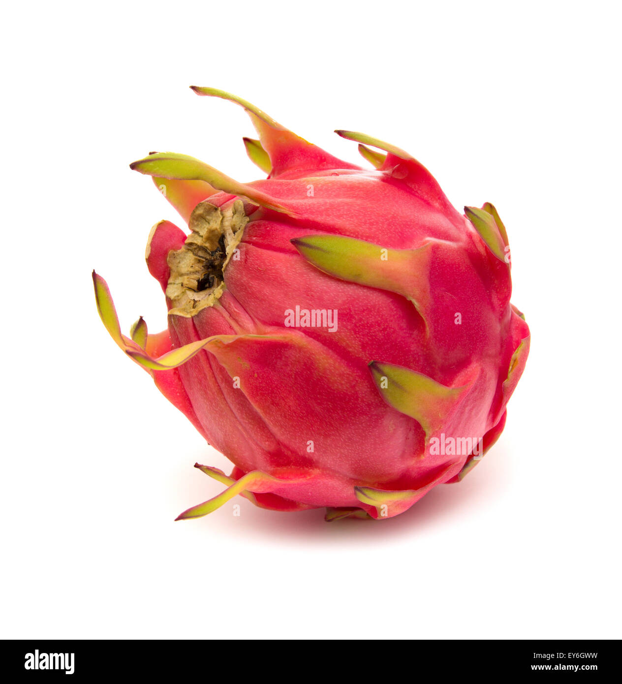 whole red dragon fruit with green scales isolated on white Stock Photo