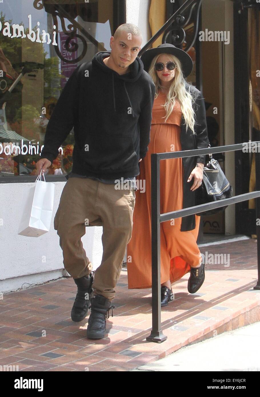 A very pregnant Ashlee Simpson and Evan Ross leaving Bel Bambini baby