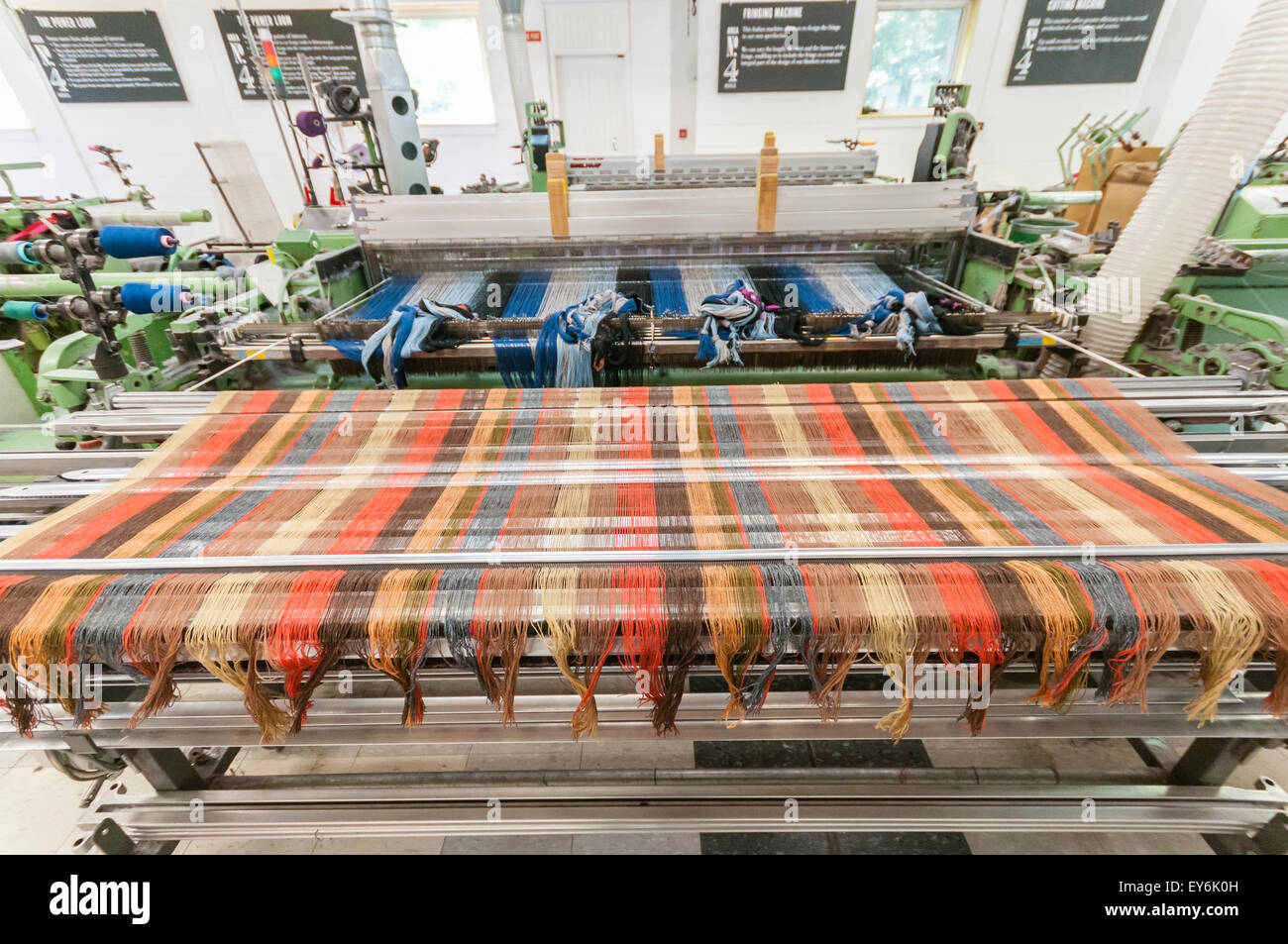 Wool textile cloth being woven on a weaving loom at Avoca Handweavers