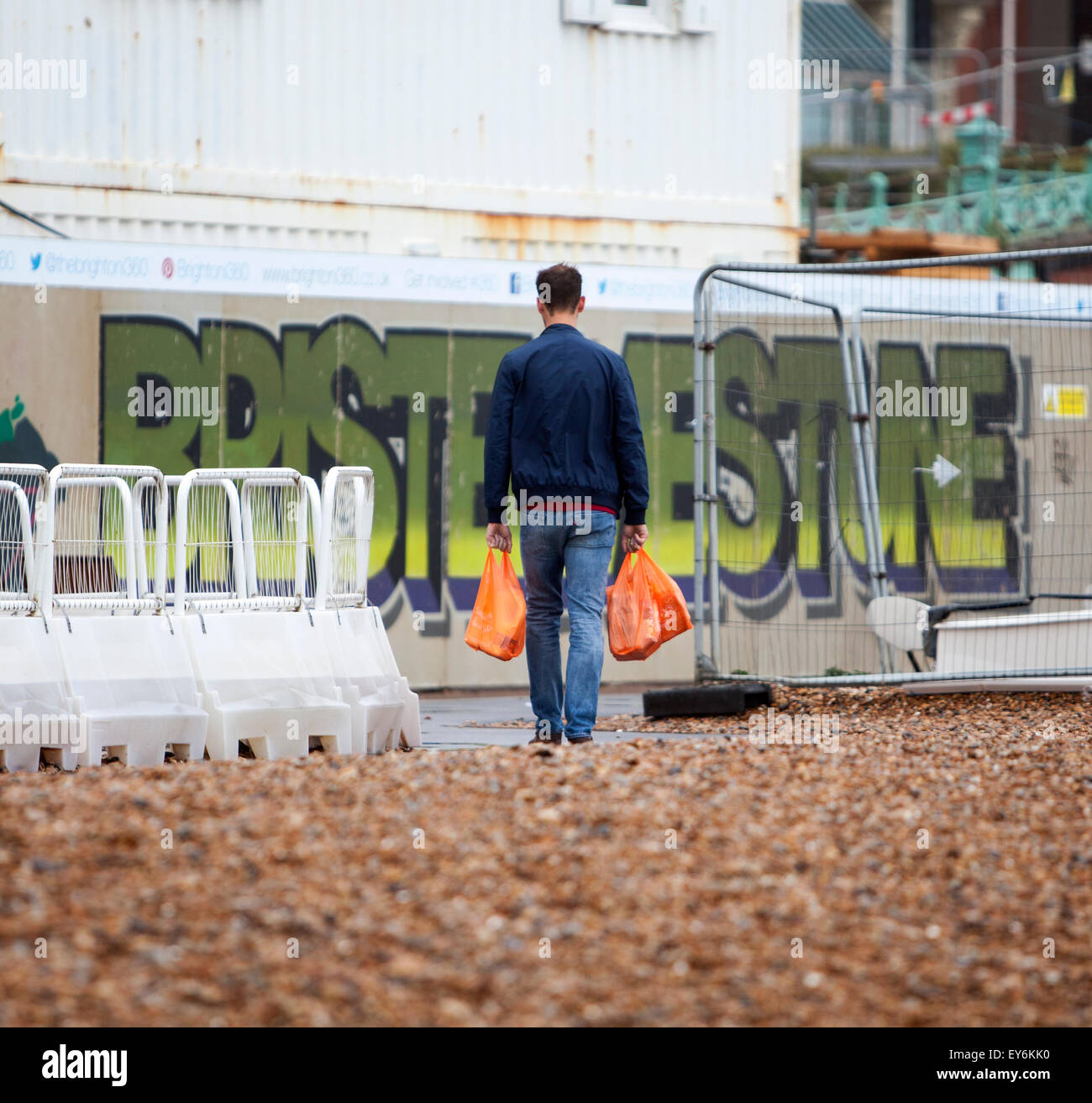 Man shopping bags hi-res stock photography and images - Alamy
