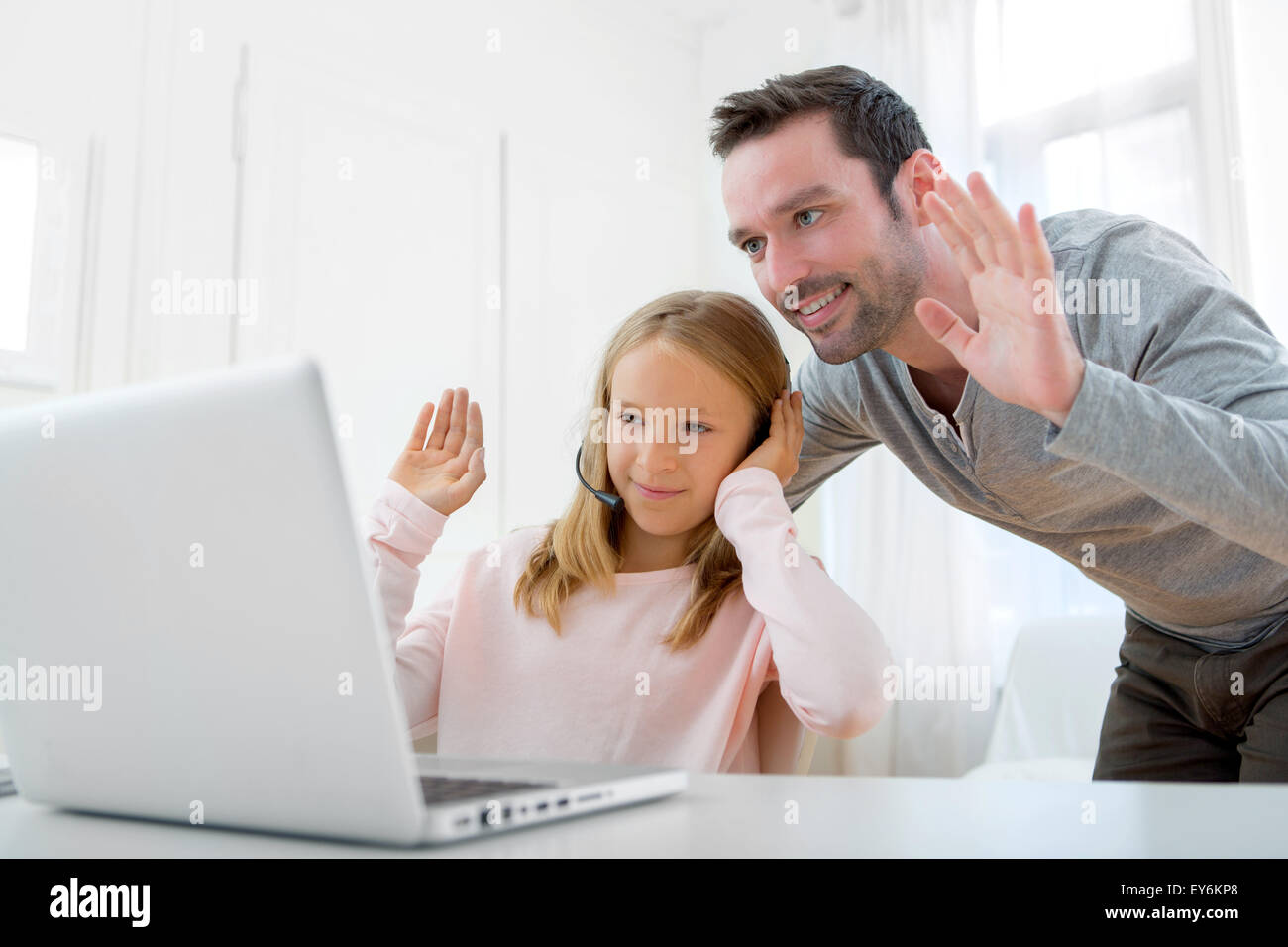 Girl hugging laptop hi-res stock photography and images - Alamy