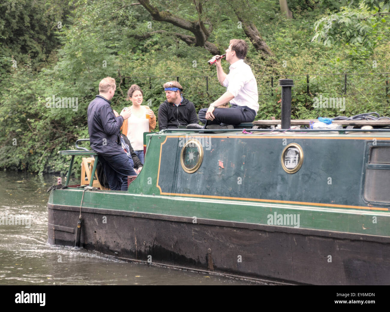 canal boat,  young people on barge,  barge trip Stock Photo