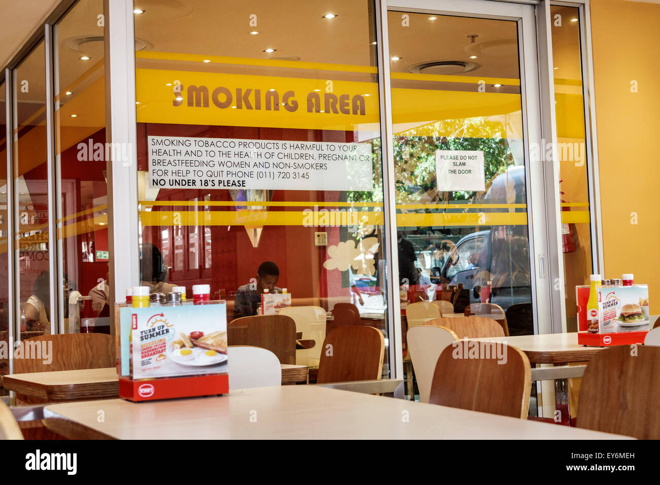 Cape Town South Africa,City Centre,center,St. George's Mall,Wimpy,restaurant restaurants food dining cafe cafes,interior inside,enclosed smoking area, Stock Photo