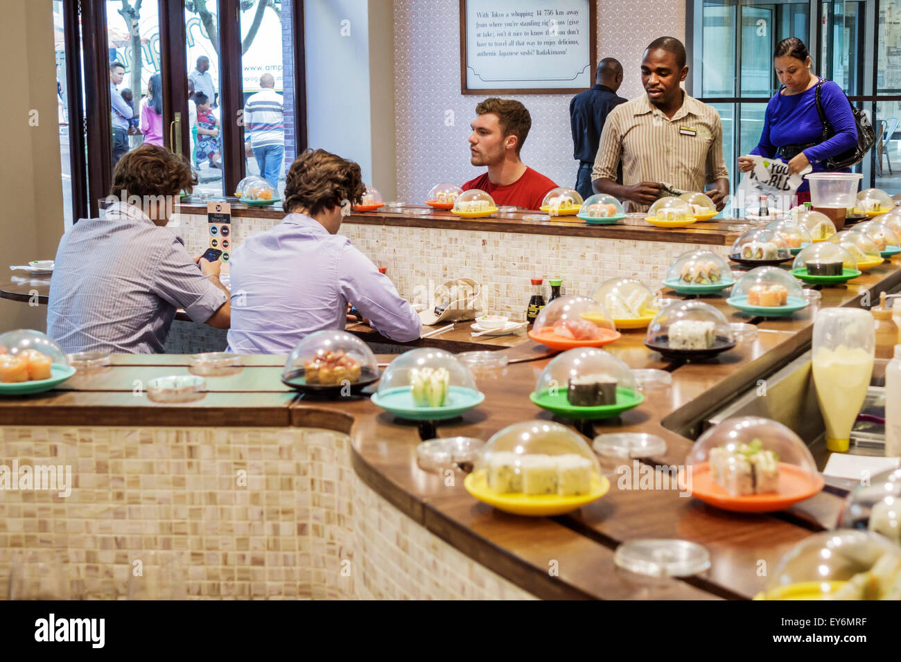 Cape Town South Africa,City Centre,center,St. George's Mall,Food Lover's Market,Japanese sushi,restaurant restaurants food dining cafe cafes,conveyor Stock Photo