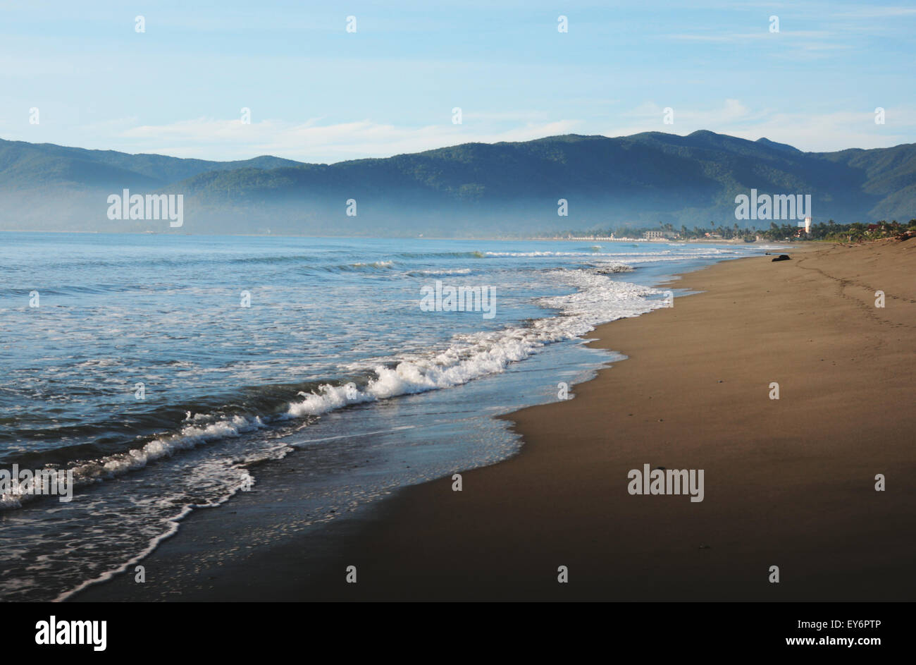 Early morning walking along Sabang Beach, Baler Stock Photo