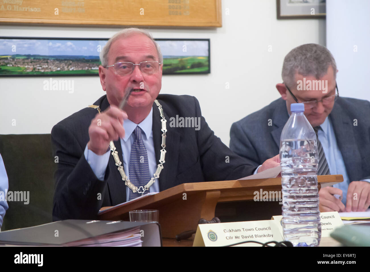 Oakham, UK. 22nd July, 2015. Chairman of Oakham Town Council and Mayor of Oakham, Councillor Alf Dewis faced allegations of bullying, improper accounting, fraud, and bringing the council into disrepute, at an extraordinary meeting of the full council when he faced a vote of no confidence proposed by Councillor Martin Brookes. There were no seconders for the proposal and so Cllr Dewis won the day and is still the Chairman of Oakham Town Council. Credit:  Jim Harrison/Alamy Live News Stock Photo