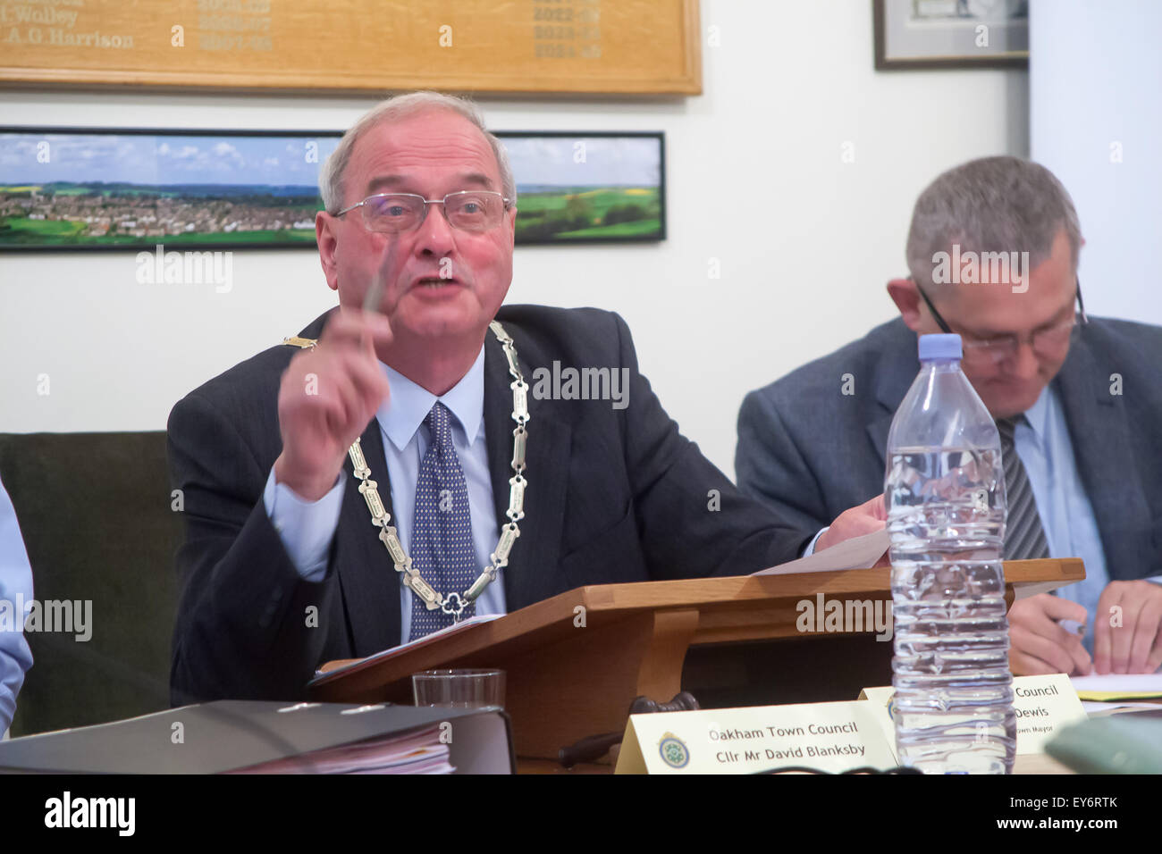 Oakham, UK. 22nd July, 2015. Chairman of Oakham Town Council and Mayor of Oakham, Councillor Alf Dewis faced allegations of bullying, improper accounting, fraud, and bringing the council into disrepute, at an extraordinary meeting of the full council when he faced a vote of no confidence proposed by Councillor Martin Brookes. There were no seconders for the proposal and so Cllr Dewis won the day and is still the Chairman of Oakham Town Council. Credit:  Jim Harrison/Alamy Live News Stock Photo